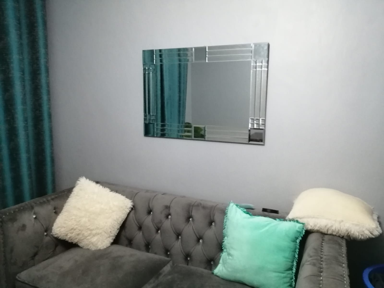 Load video: DIY WALL MIRROR USING BEVELLED MIRROR TILES FOR WALL DECOR By NIMMIZ HOME DECOR